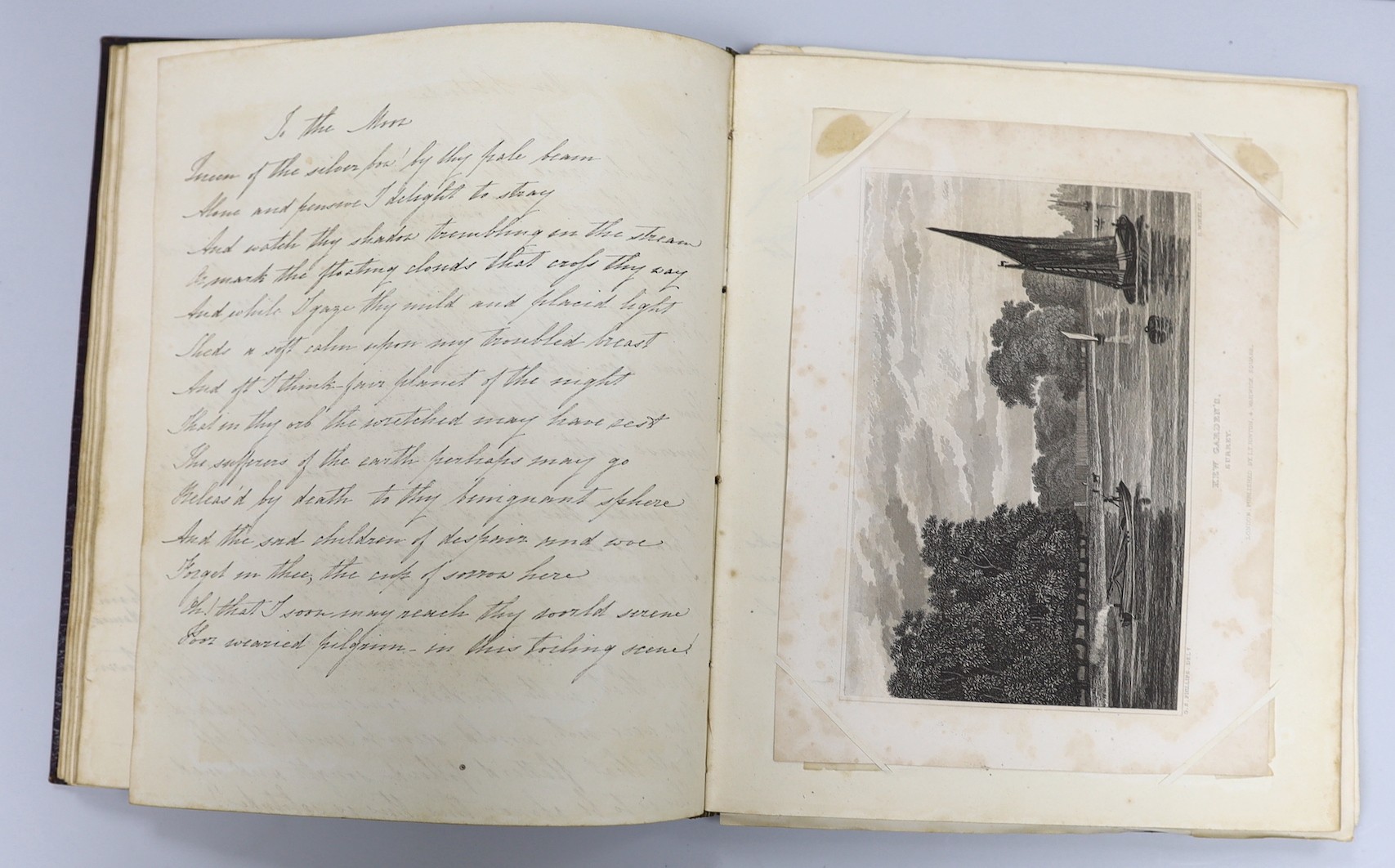 An early 19th century hand written journal, sketch book with scraps, coloured engravings, etc.